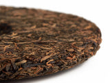 Sheng Pu Erh Qiao Mu Wang, fabryka Mengku, AA, 2011