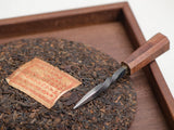Pu Erh tea cake cutting board, wenge, 24x24x3 cm